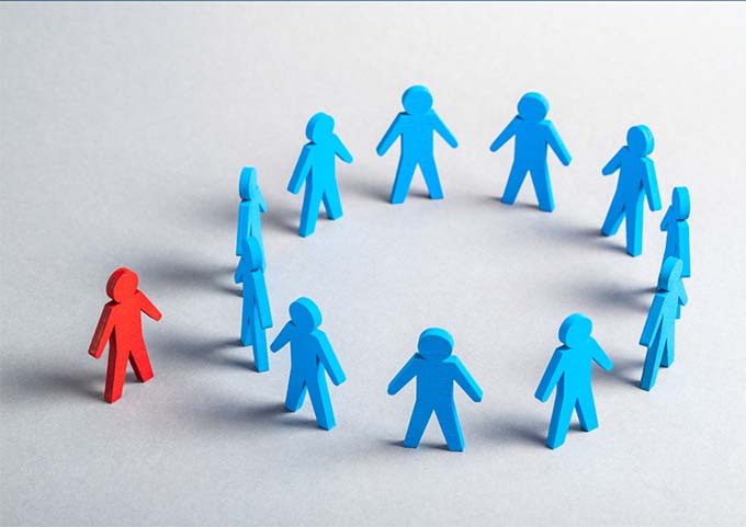 An illustration of one figure being excluded from a group